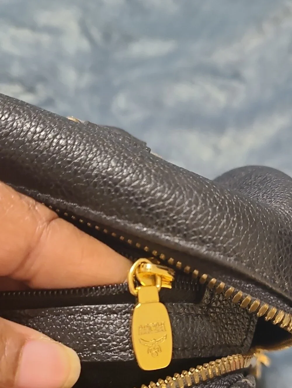 MCM Black Leather Bag with Gold Logo Plate